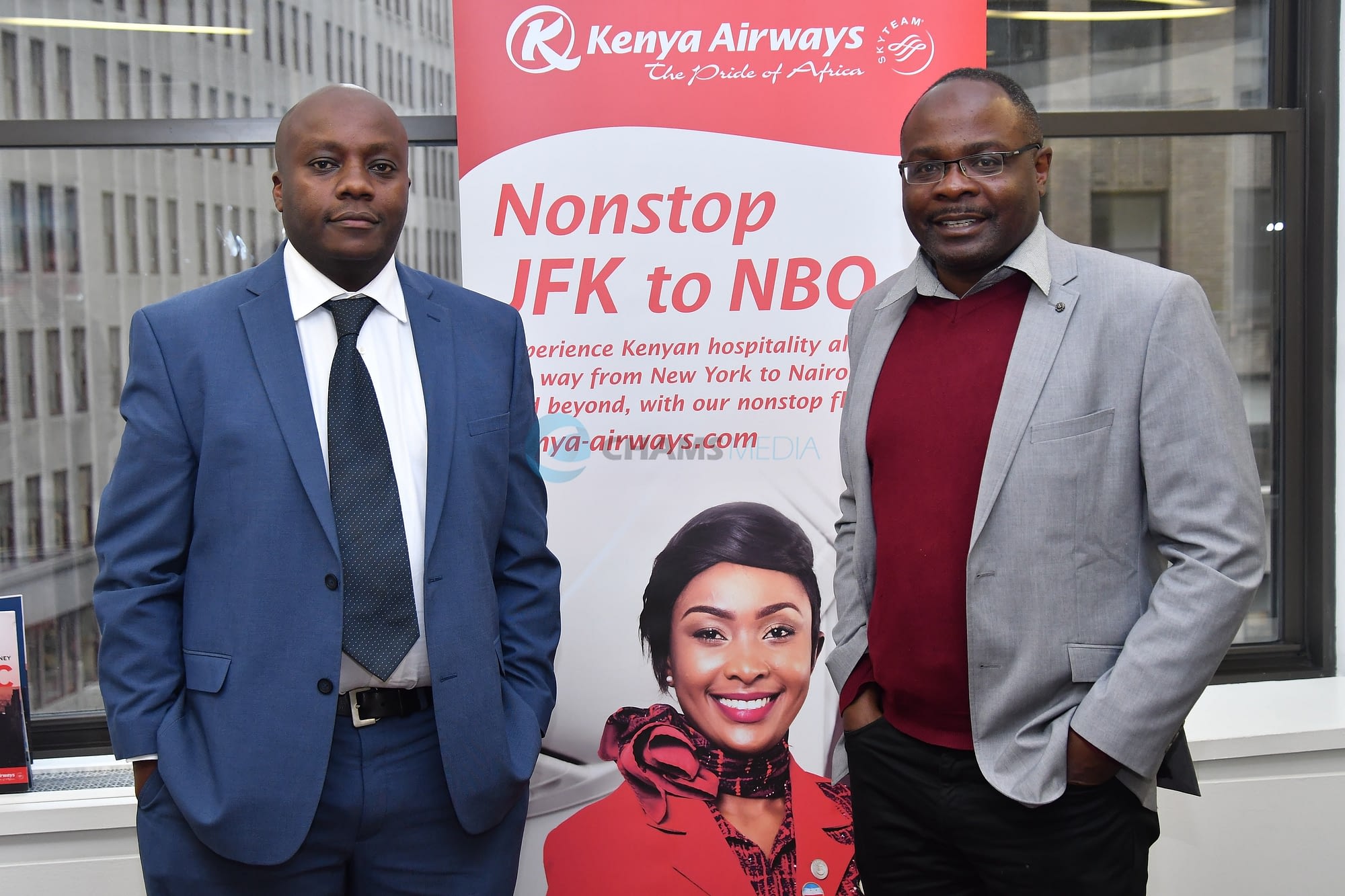 CHAMS Media CEO Alex Chamwada with KQ Manager for USA Stephen Ngamu