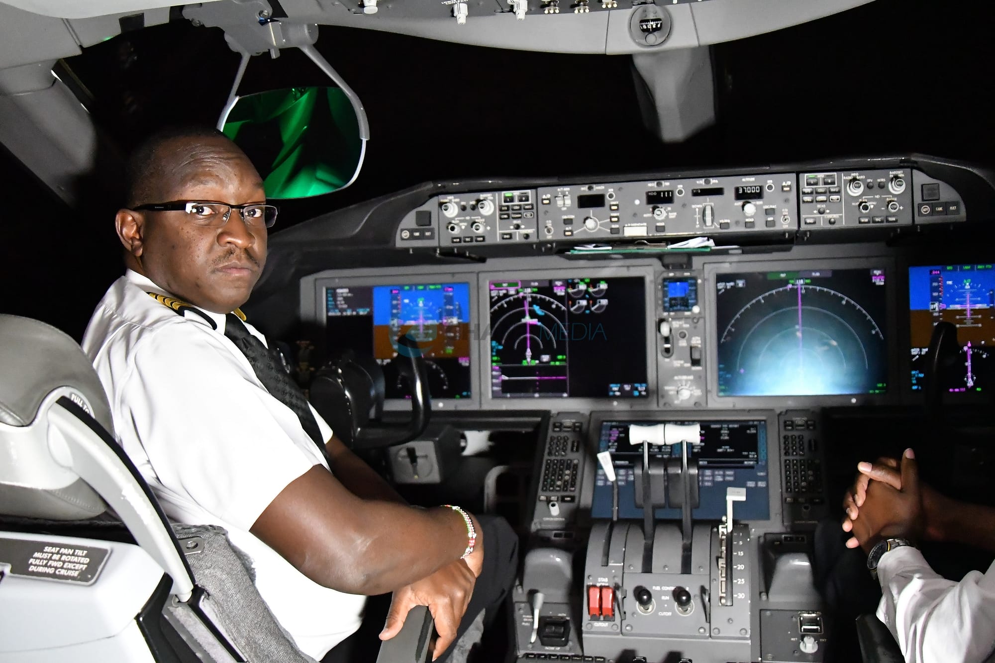 KQ Capt George Ayuga in the cockpit on Nairobi-New York Route